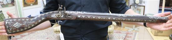 Two Middle Eastern muskets length 95cm